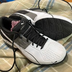 Next to new mens 8.5 black/white Puma athletic shoes.